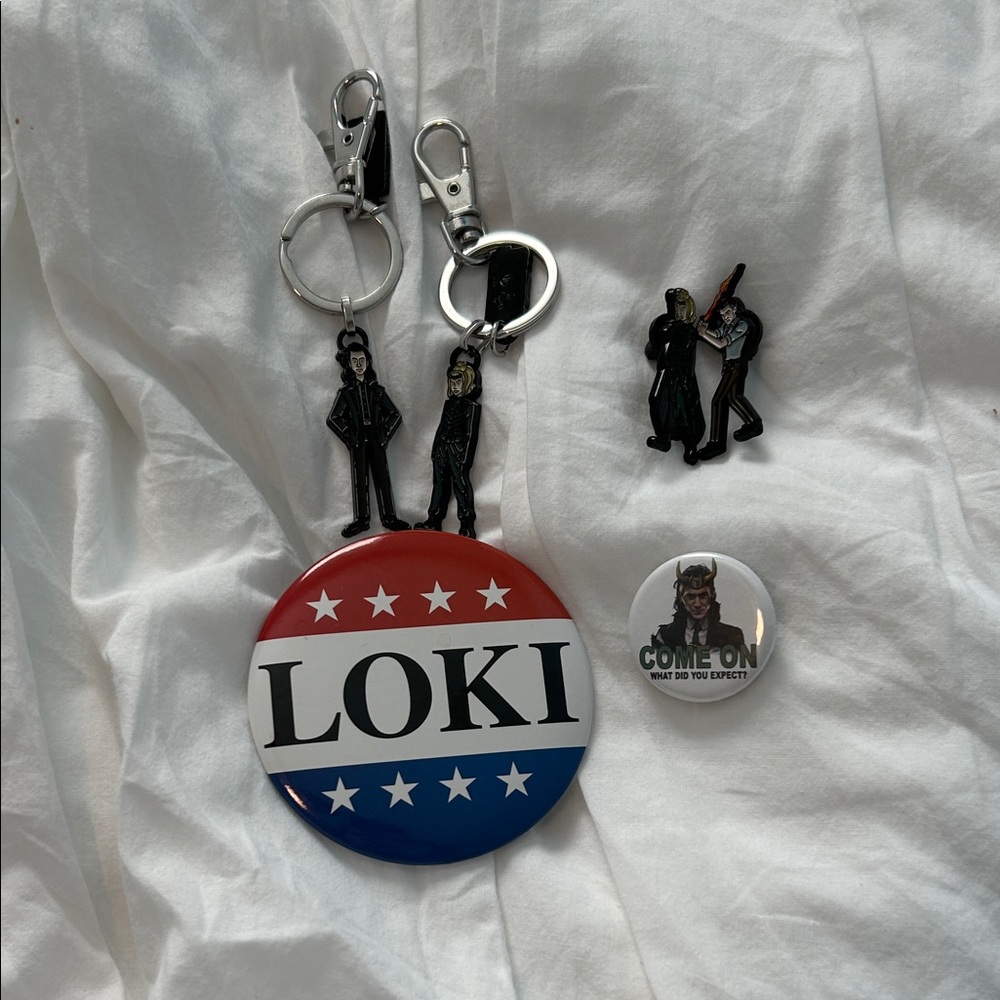 Marvel Loki Sylvie pins, buttons, and keychains. Marvel